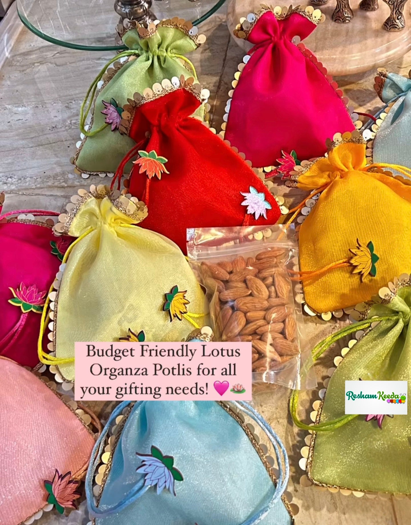 Organza Potlis with Lotus Bootis Perfect for Diwali Navratri House Warming Haldi Mehendi Babyshower and Wedding Gifting (Pack of 20)